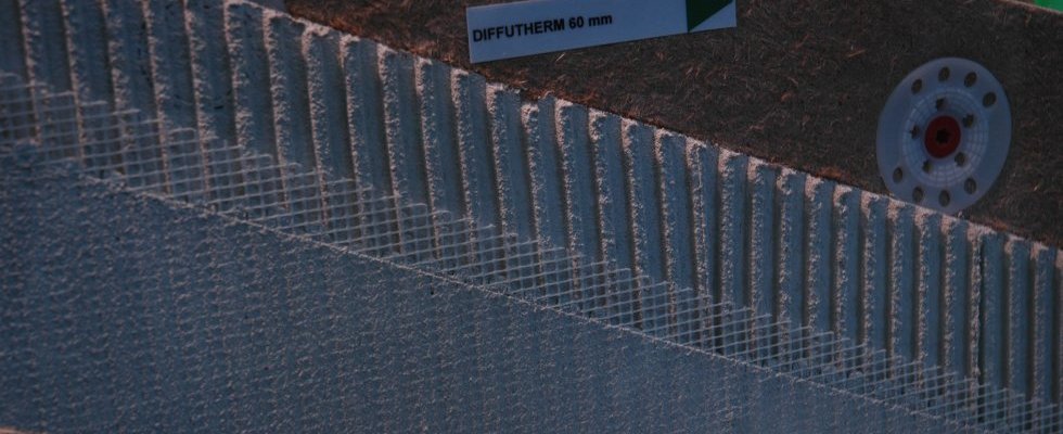 Mur bois massif recouvert isolant avec enduit
